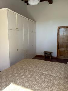 Postel nebo postele na pokoji v ubytování Rustico Sant'Emilio