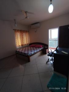 Ένα ή περισσότερα κρεβάτια σε δωμάτιο στο Premium 3bhk furnished apartment - gated community