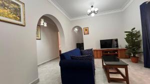 TV a/nebo společenská místnost v ubytování Olive Glow