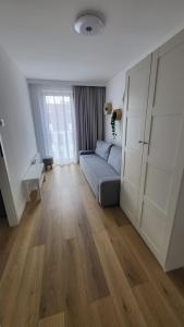 Postel nebo postele na pokoji v ubytování Apartament Stegna Baltic Park