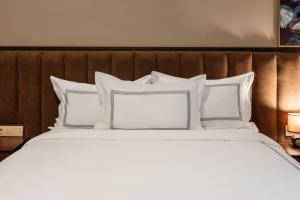 Postel nebo postele na pokoji v ubytování Elea Old Tbilisi Hotel