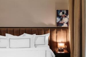 Postel nebo postele na pokoji v ubytování Elea Old Tbilisi Hotel