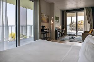 Postel nebo postele na pokoji v ubytování Vision Hotel