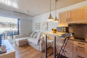 Kuchyň nebo kuchyňský kout v ubytování Apartamento Arimar Sunset