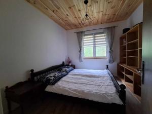 Postel nebo postele na pokoji v ubytování Chataanicka