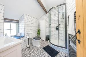 Koupelna v ubytování Felinddwr + 27 fotografií