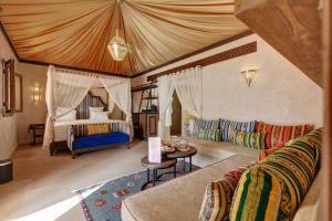Ένα ή περισσότερα κρεβάτια σε δωμάτιο στο Palmeraie Oasis Camp - A member of Barcelo Hotel Group