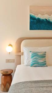 Postel nebo postele na pokoji v ubytování VILLA MARGARIT Boutique Hotel