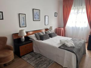 Posteľ alebo postele v izbe v ubytovaní Apartamento Tranquilo Zona Paseo de Lordelo - WIFI - Mascotas