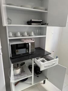 Η κουζίνα ή μικρή κουζίνα στο Apartamento Plantar e Cuidar