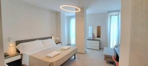 Postel nebo postele na pokoji v ubytování Hotel Caravel