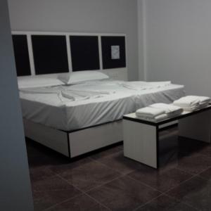 Postel nebo postele na pokoji v ubytování Herges Hotel