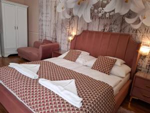 Posteľ alebo postele v izbe v ubytovaní Kék Lagúna Wellness Apartmanok