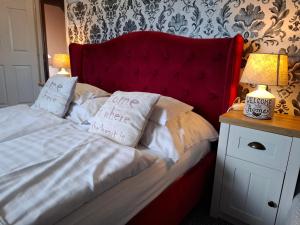 Posteľ alebo postele v izbe v ubytovaní Kék Lagúna Wellness Apartmanok