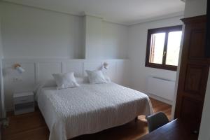 A bed or beds in a room at Lizargarate