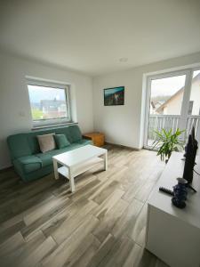 TV a/nebo společenská místnost v ubytování Apartment Mina