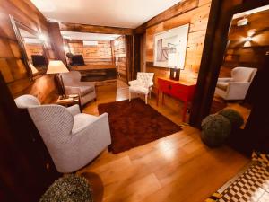 an overhead view of a living room with furniture at Hotel Sonetto in Santiago