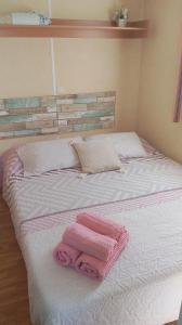 Postel nebo postele na pokoji v ubytování La Vida el Verano en Novo Sancti Petri - Casa Acogedora