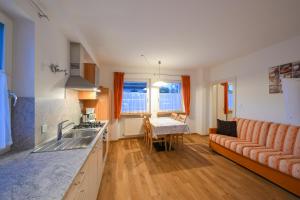 Posezení v ubytování Apartments Ferdigg