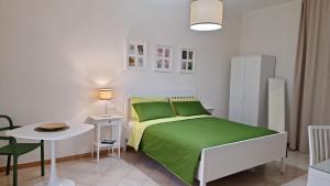 Postel nebo postele na pokoji v ubytování Casa Chilù