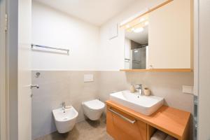 Koupelna v ubytování Apartments Ferdigg