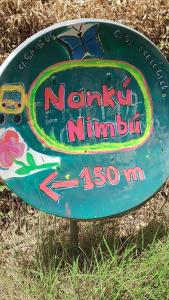 Certificado, premio, señal o documento que está expuesto en Nanku Nimbu Casa-Bus equipada cerca de playas