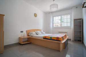 En eller flere senge i et værelse på Bellavista + 11 billeder