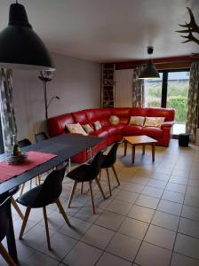 Posezení v ubytování Gîte Les Framboisiers