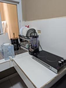 Kuchyň nebo kuchyňský kout v ubytování 5 minutos de UNITEC Apartamento completo de un cuarto