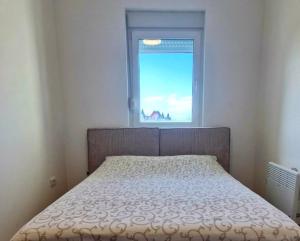 Apartman LUX客房内的一张或多张床位