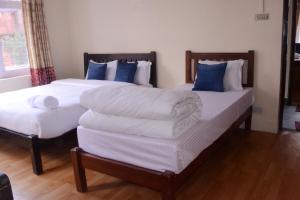 Letto o letti in una camera di My Garden House