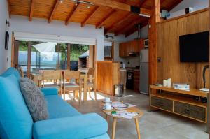 Posezení v ubytování Atardeceres del Lago - Alojamientos con Vista al Lago Villa La Angostura