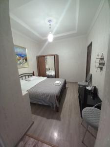 Postel nebo postele na pokoji v ubytování Hotel Zaira