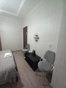 Postel nebo postele na pokoji v ubytování Hotel Zaira