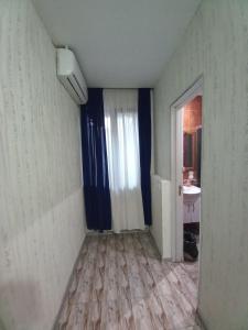 Postel nebo postele na pokoji v ubytování Hotel Zaira