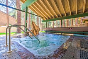 a hot tub in the middle of a building at Walk to Shops & Eats: Mammoth Lakes Condo w/ Pool in Mammoth Lakes
