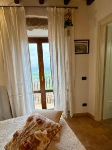 Postel nebo postele na pokoji v ubytování Relais Il Monaco