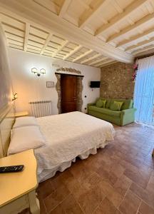 Postel nebo postele na pokoji v ubytování Relais Il Monaco