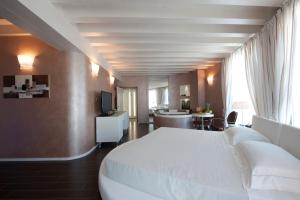 Postel nebo postele na pokoji v ubytování Hotel Morgana