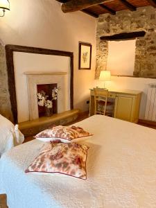 Postel nebo postele na pokoji v ubytování Relais Il Monaco