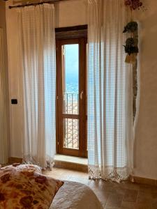 Postel nebo postele na pokoji v ubytování Relais Il Monaco