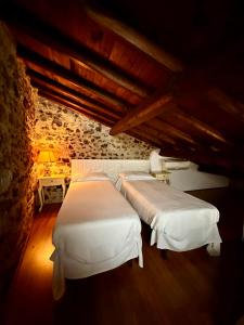 Postel nebo postele na pokoji v ubytování Relais Il Monaco