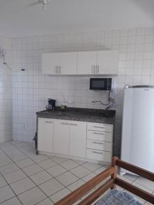 Kuchyň nebo kuchyňský kout v ubytování Apt Praia do Sique 12