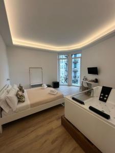 Postel nebo postele na pokoji v ubytování 20 Settembre Rooms
