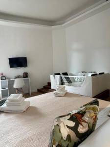 TV a/nebo společenská místnost v ubytování 20 Settembre Rooms