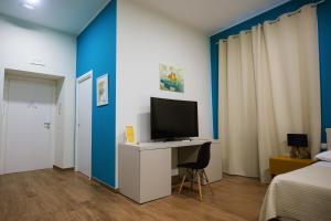 TV a/nebo společenská místnost v ubytování Terminal 1 Guest House