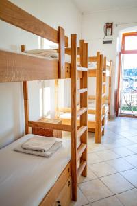 Ein Bett oder Betten in einem Zimmer der Unterkunft Anchi Guesthouse