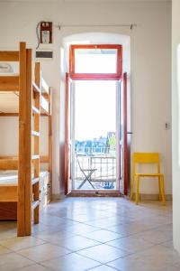 Ein Bett oder Betten in einem Zimmer der Unterkunft Anchi Guesthouse
