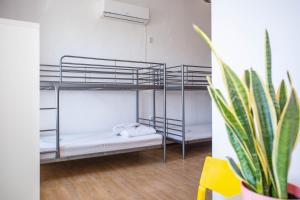 Ein Bett oder Betten in einem Zimmer der Unterkunft Anchi Guesthouse