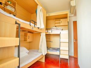 Köök või kööginurk majutusasutuses Yiweidu Youth Apartment